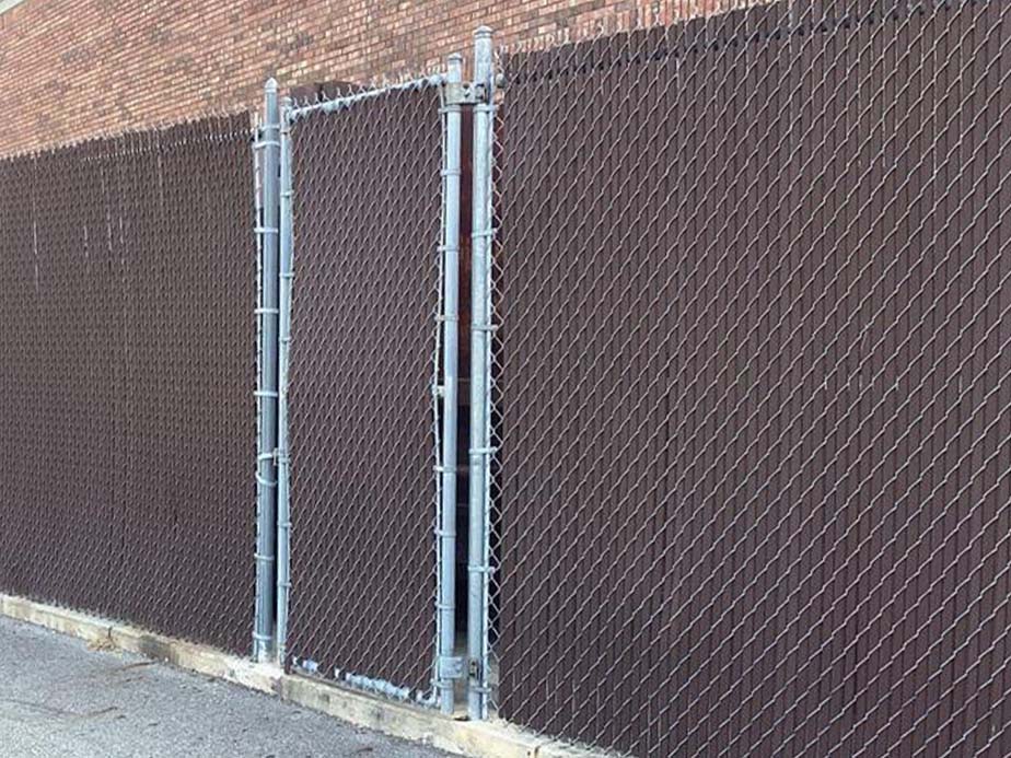 Chain link dumpster enclosures with privacy slats Columbus Ohio